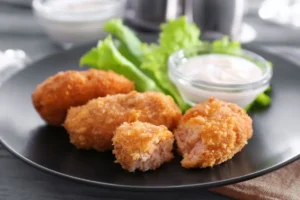Crocchette con salmone e salsa