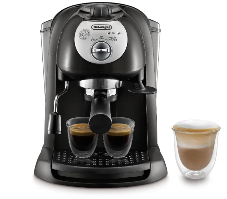macchina da caffè con accanto un cappuccino