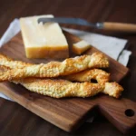 grissini di pasta sfoglia e parmigiano