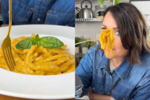 pasta in un piatto e ragazza che l'assaggia