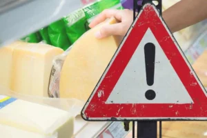 formaggio e segno di pericolo