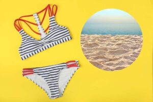 un costume e nel cerchietto la spiaggia