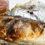 Pesce al cartoccio con condimento