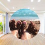 casa e piedi con la sabbia