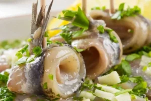 Involtini di alici ripieni con erbe aromatiche