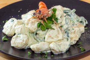 gnocchetti cremosi con zucchine e gamberi