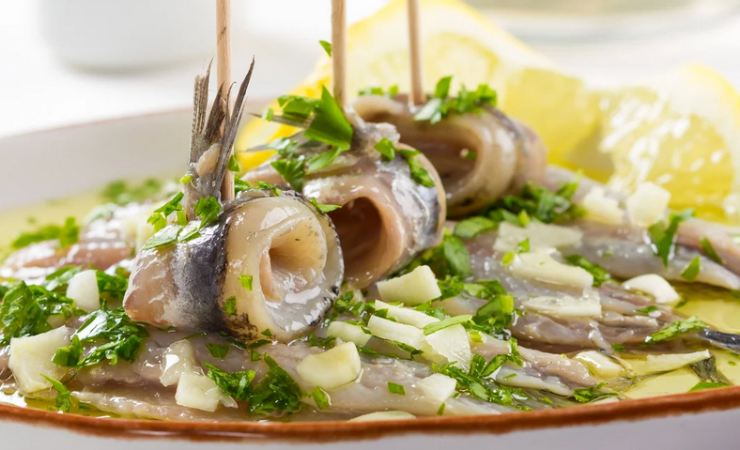 Involtini di alici con erbe aromatiche