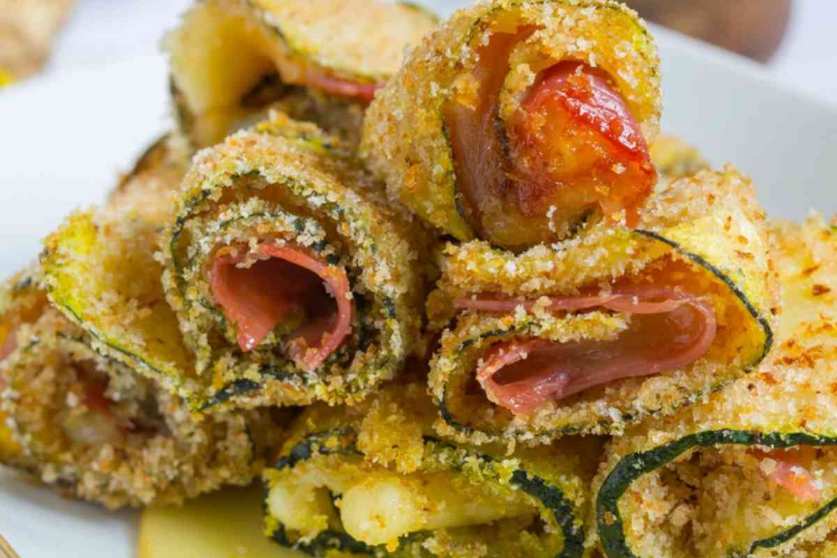 Involtini di zucchine gratinati con ripieno di prosciutto cotto