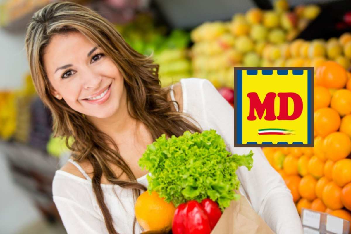 donna al supermercato che tiene una busta piena di ortaggi e logo md