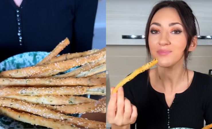 grissini e ragazza che li assaggia